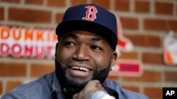 FILE - David Ortiz speaks during a news conference before a baseball game against the Toronto Blue Jays at Fenway Park, in Boston, Sept. 30, 2016.