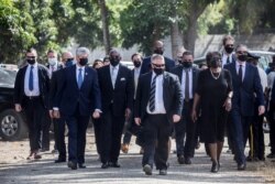 U.S. officials including Rep. Jeff Fortenberry (R-NE), 2nd L, Congressman Gregory W. Meeks (D-NY), 3rd L, and Linda Thomas-Greenfield, 2nd R, U.S. ambassador to the United Nations, arrive for for the funeral of slain President Jovenel Moïse.