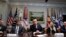 President Donald Trump, center, at the during a healthcare roundtable in the Roosevelt Room of the White House, Wednesday, Jan. 23, 2019, in Washington.