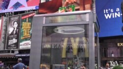 Times Square Phone Booth Art Documents Immigrants' Stories of Their Arrivals