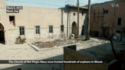 Mosul Residents Return to Church Used by IS to Store Bombs