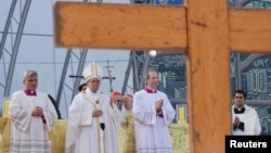 Pope Francis celebrates his final Mass of his week-long visit to Brazil, on Copacabana Beach in Rio de Janeiro, July 28, 2013.