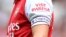 FILE- The "Visit Rwanda" logo is seen on the sleeve of Arsenal's Norwegian midfielder Martin Odegaard during a club friendly football match between Arsenal and Sevilla at the Emirates Stadium in London. July 30, 2022. 