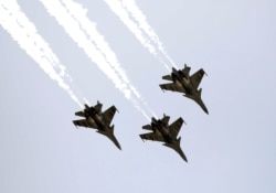 Indian Air Force (IAF) Sukhoi Su-30MKI fighter jets perform to show gratitude towards the frontline healthworkers fighting the coronavirus disease (COVID-19) outbreak, in Gandhinagar, May 3, 2020.