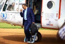 FILE - World Health Organization Director-General Tedros Adhanom Ghebreyesus arrives by helicopter at Ruhenda airport in Butembo, eastern Congo, June 15, 2019.