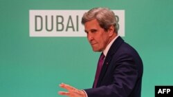 FILE — US Special Presidential Envoy for Climate John Kerry arrives for a press conference at the United Nations climate summit in Dubai on December 6, 2023.