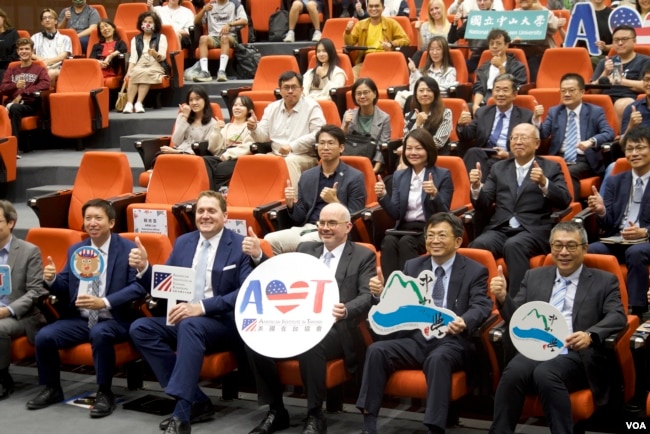 AIT Director Raymond F. Greene took a group photo before delivering remarks at National Sun Yat-sen University, Kaohsiung, Taiwan. (12/04/2024)