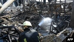 Russian missiles hit a popular Kharkiv mall crowded shoppers 