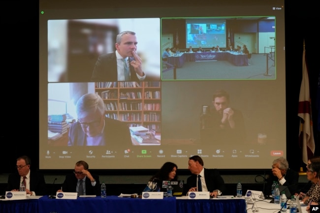 FILE - New College of Florida's board of trustees, including conservative activist Christopher Rufo, who is seen on screen, lower right, attending remotely, meet to vote on proposed changes to the school, Tuesday, Feb. 28, 2023, in Sarasota, Fla. (AP Photo/Rebecca Blackwell)