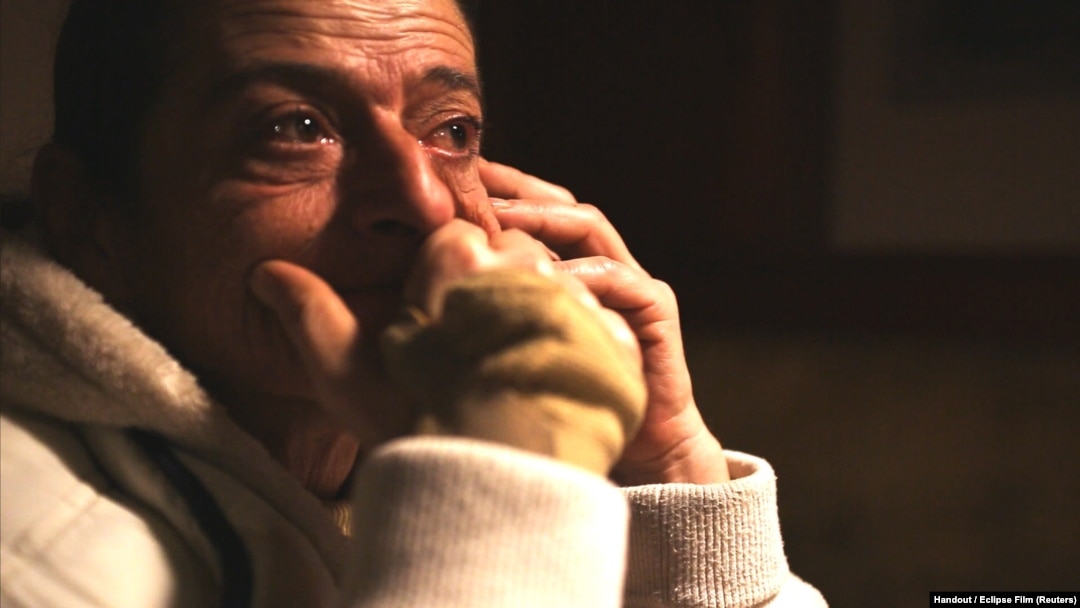 Marish, a Hungarian domestic slave, is captured in a screengrab from the documentary film 'A Woman Captured' released in 2017.