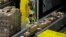 FILE - Packages move down a conveyor system were they are directed to the proper shipping area at the new Amazon Fulfillment Center, Feb. 9, 2018, in Sacramento, Calif. 