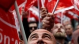 Members of UGT (Union General de Trabajadores) and CCOO (Confederacion Sindical de Comisiones Obreras), two main Spanish trade unions, protest demanding fewer working hours from 40 to 37.5 hours per week, in Madrid, Spain, Sept. 26, 2024. 