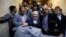 <div>حضور محمد هاشمی در نام نویسی انتخابات ریاست جمهوری حتی با وجود مانع بر سر راهش<br />
عکس: علی شیربند</div>

