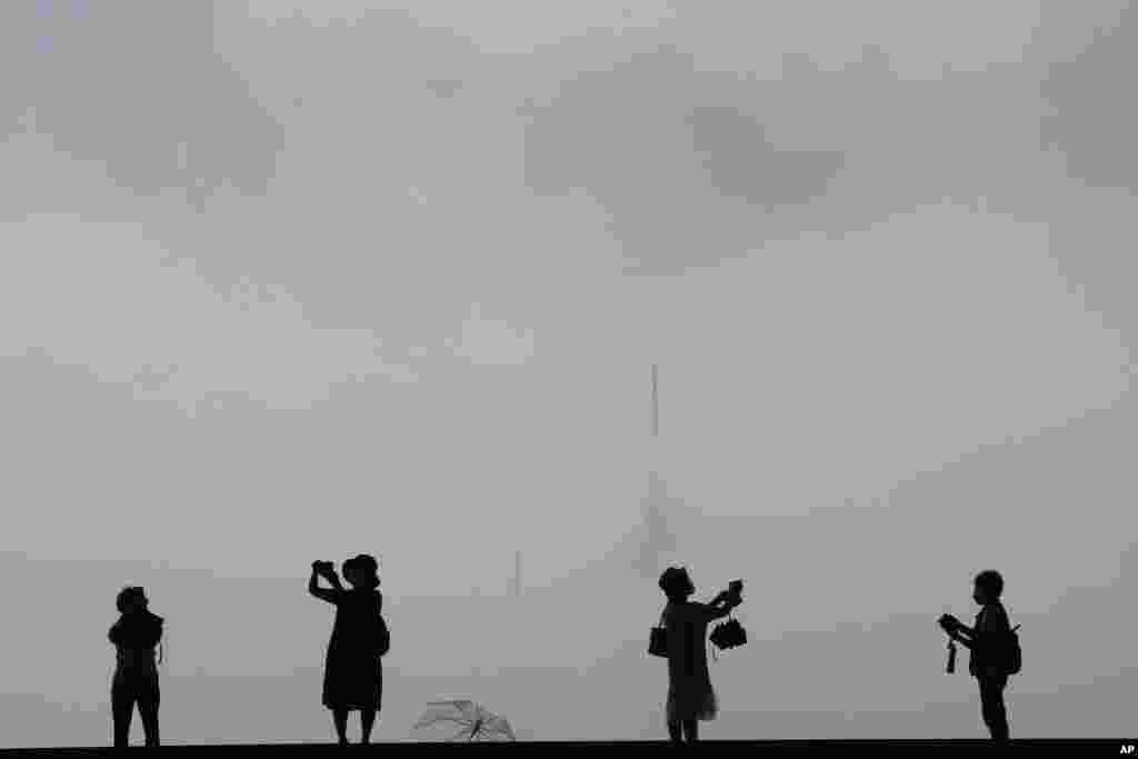 Visitors take pictures at the National Museum of Korea in Seoul, South Korea.