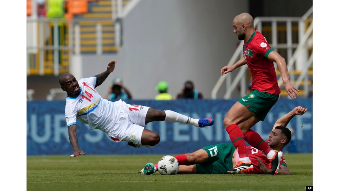 FILE - DR Congo's Gael Kakuta, left, and Morocco's Selim Amallah, down, challenge for the ball during the Group F soccer match between Morocco and DR Congoin San Pedro, Ivory Coast, January 21, 2024