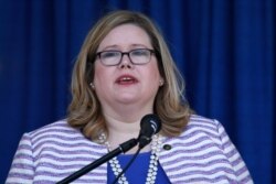 FILE - General Services Administration Administrator Emily Murphy speaks a ceremony in Washington, June 21, 2019.