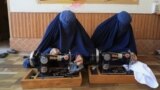 Afghan women attend tailoring class at the Skills Academy for Needy Aspirants, in Peshawar