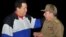 In this picture released Tuesday, Dec. 11, 2012 by Cuba's state newspaper Granma, Cuba's President Raul Castro, right, receives Venezuela's President Hugo Chavez at the Jose Marti International Airport in Havana, Cuba, Monday, Dec. 10, 2012. 