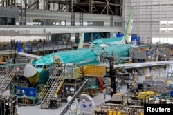 FILE: Pesawat Boeing 737 MAX dirakit di pabrik perusahaan tersebut di Renton, Washington, Amerika Serikat, 25 Juni 2024.( Jennifer Buchanan/Pool via REUTERS)