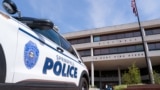 FILE - A police car sits outside Ohio City Hall which received a bomb threat on Thursday morning, in Springfield, Ohio, U.S., September 12, 2024. (REUTERS/Julio-Cesar Chavez) 