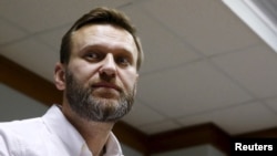 Russian anti-corruption campaigner and prominent opposition figure Alexei Navalny is seen attending a hearing at the Moscow City Court in Moscow, Russia, Feb. 12, 2016. 