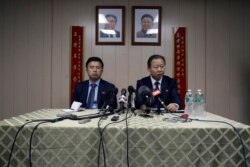FILE - Ambassador of the Permanent Mission of the Democratic People's Republic of Korea to the United Nations Jang Il Hun, right, is joined by Kwon Jong Gun at a news conference at the DPRK mission in New York, July 28, 2015.