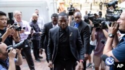 FILE - Rapper Meek Mill arrives at a Pennsylvania appeals court in Philadelphia, July 16, 2019.