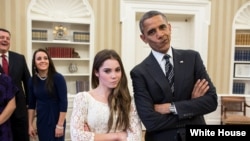 President Barack Obama jokingly mimics U.S. Olympic gymnast McKayla Maroney's "not impressed" look while greeting members of the 2012 U.S. Olympic gymnastics teams in the Oval Office, Nov. 15, 2012.
