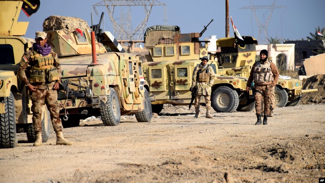 Pasukan Irak siaga di Ramadi utara pada hari Senin (21/12), dalam upaya merebut kembali kota ini dari militan ISIS. 