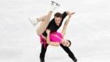 Canada's Lia Pereira and Trennt Michaud perform during the Pairs Short Program in Four Continents Figure Skating Championships in Seoul, South Korea, Feb. 20, 2025.