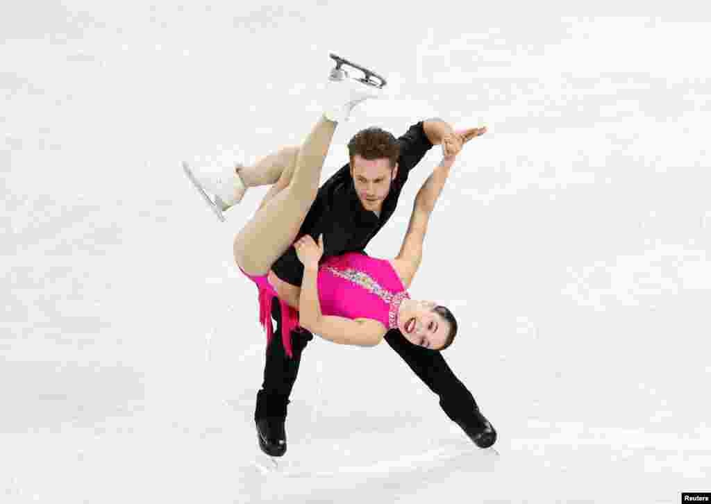 Canada&#39;s Lia Pereira and Trennt Michaud perform during the Pairs Short Program in the Four Continents Figure Skating Championships in Seoul, South Korea.