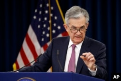 FILE - Federal Reserve Board Chair Jerome Powell speaks at a news conference following a two-day meeting of the Federal Open Market Committee, May 1, 2019, in Washington.