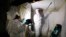Asbestos Removal Technologies Inc. technicians are seen performing asbestos abatement in Howell, Michigan, Oct. 18, 2017.