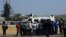 Striking workers of the Anglo American Platinum (Amplats) move from shaft to shaft to call on their colleagues to stop working in Rustenburg, September 12, 2012. 