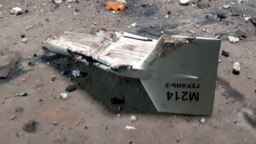 FILE - This undated photograph released by the Ukrainian military's Strategic Communications Directorate shows the wreckage of what Kyiv has described as an Iranian Shahed drone downed near Kupiansk, Ukraine.