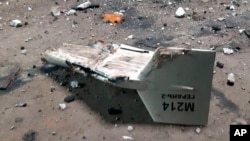 FILE - This undated photograph released by the Ukrainian military's Strategic Communications Directorate shows the wreckage of what Kyiv has described as an Iranian Shahed drone downed near Kupiansk, Ukraine.