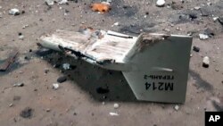 FILE - This undated photograph released by the Ukrainian military's Strategic Communications Directorate shows the wreckage of what Kyiv has described as an Iranian Shahed drone downed near Kupiansk, Ukraine.