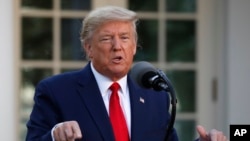 President Donald Trump speaks about the coronavirus in the Rose Garden of the White House, March 30, 2020, in Washington