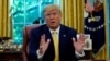 FILE - U.S. President Donald Trump speaks during a meeting in the Oval Office at the White House, Oct. 11, 2019. 