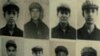 Cambodian military officials line up in front the top leaders of Khmer Rouge portraits, from right, former Khmer Rouge Foreign Minister Ieng Sary, former Khmer Rouge head of state Khieu Samphan, and former Deputy Secretary Nuon Chea, during the trial of