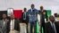 Zimbabwean President Emmerson Mnangagwa delivers a speech during a rally with Zimbabwean businessmen and foreign investors at the Zimbabwean embassy in Pretoria, South Africa, Dec. 21, 2017.