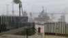 Hurricane Genevieve Weakens to Tropical Storm 
