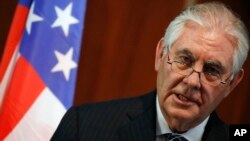 L'ex-secrétaire Rex Tillerson parle lors d'une conférence de presse à Abuja, le 12 mars 2018.