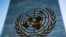 FILE - The symbol of the United Nations is displayed outside the Secretariat Building, Feb. 28, 2022, at United Nations headquarters.