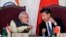  FILE - Indian Prime Minister Narendra Modi, left, talks with Chinese President Xi Jinping at the signing ceremony by foreign ministers during the BRICS summit in Goa, India, Oct. 16, 2016. 