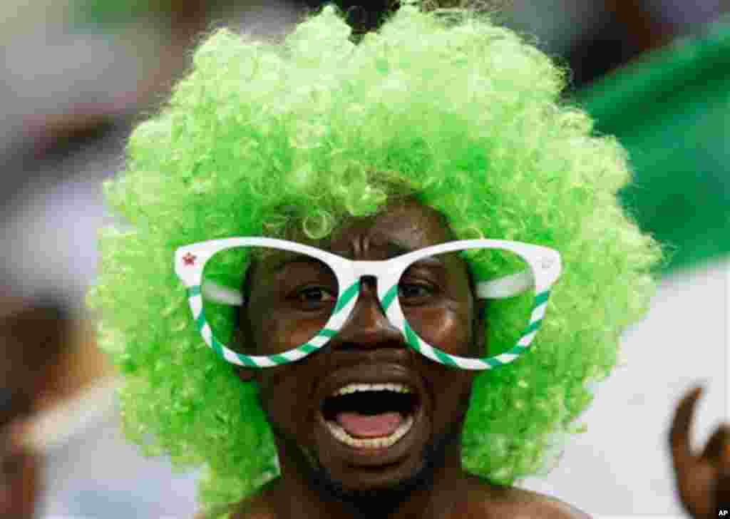 A Nigeria fan reacts at the end of the African Cup of Nations final at the Soccer City Stadium in Johannesburg, South Africa, Sunday, Feb. 10, 2013. Nigeria defeated Burkina Faso 1-0 to take the trophy. (AP Photo/Armando Franca)