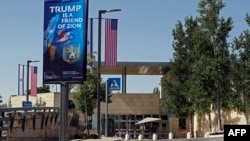A picture shows on May 11, 2018, the compound of the U.S. consulate in Jerusalem, which will host the new U.S. embassy, as posters praising the U.S. president hang in the street.
