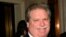 FILE - In this Feb. 27, 2008, photo, Elliott Broidy poses for a photo at an event in New York.