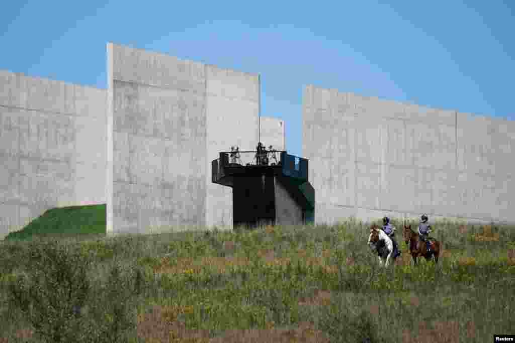 Members of the Secret Service and law enforcement officers secure the area during an event marking the 23rd anniversary of the attacks on the United States, near the Flight 93 Memorial in Stoystown, near Shanksville, Pennsylvania, Sept. 11, 2024.