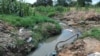 Sewer water with human waste flowing in some suburbs. In some cases, this has been worsened by heavy rains.